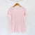 Camiseta rosa de mujer, de algodón orgánico y estampado a mano con tintas ecológicas.